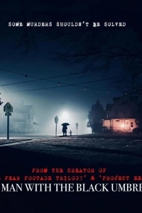 Человек с черным зонтом